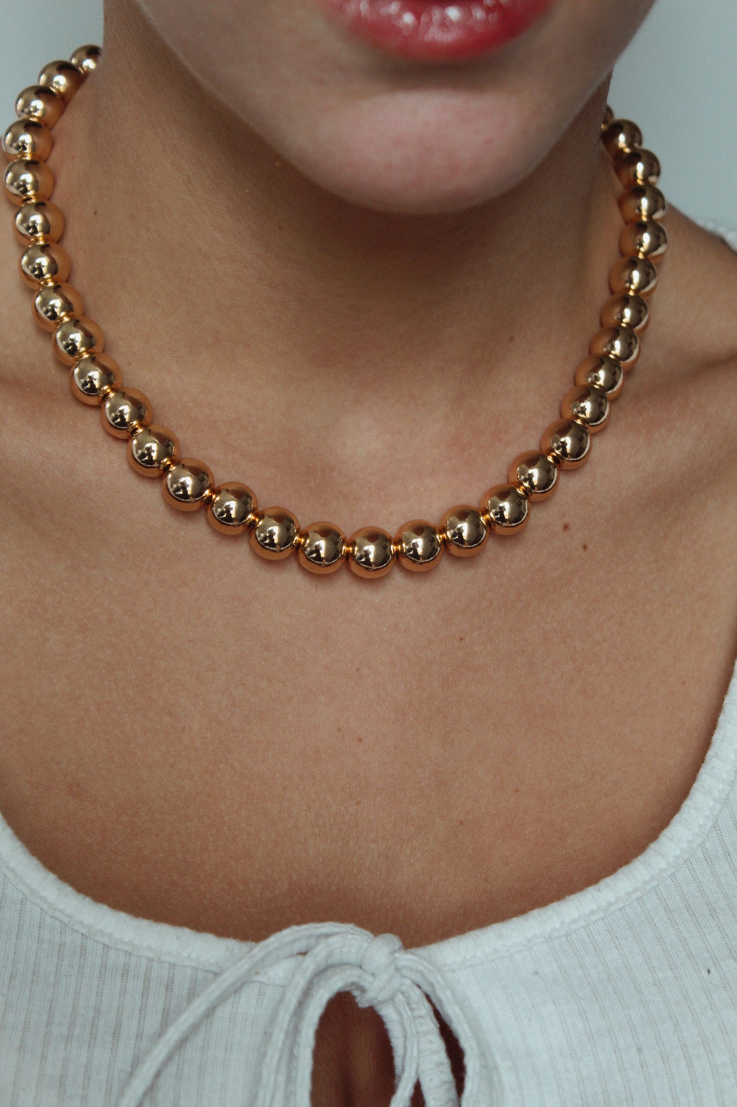 10mm Gold Kris Bead Necklace
